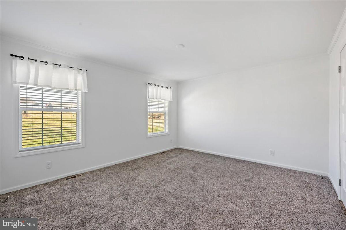 1412 Heytesbury Road Walnutport, PA 18088 - Photo 33 of 39 an empty room with windows