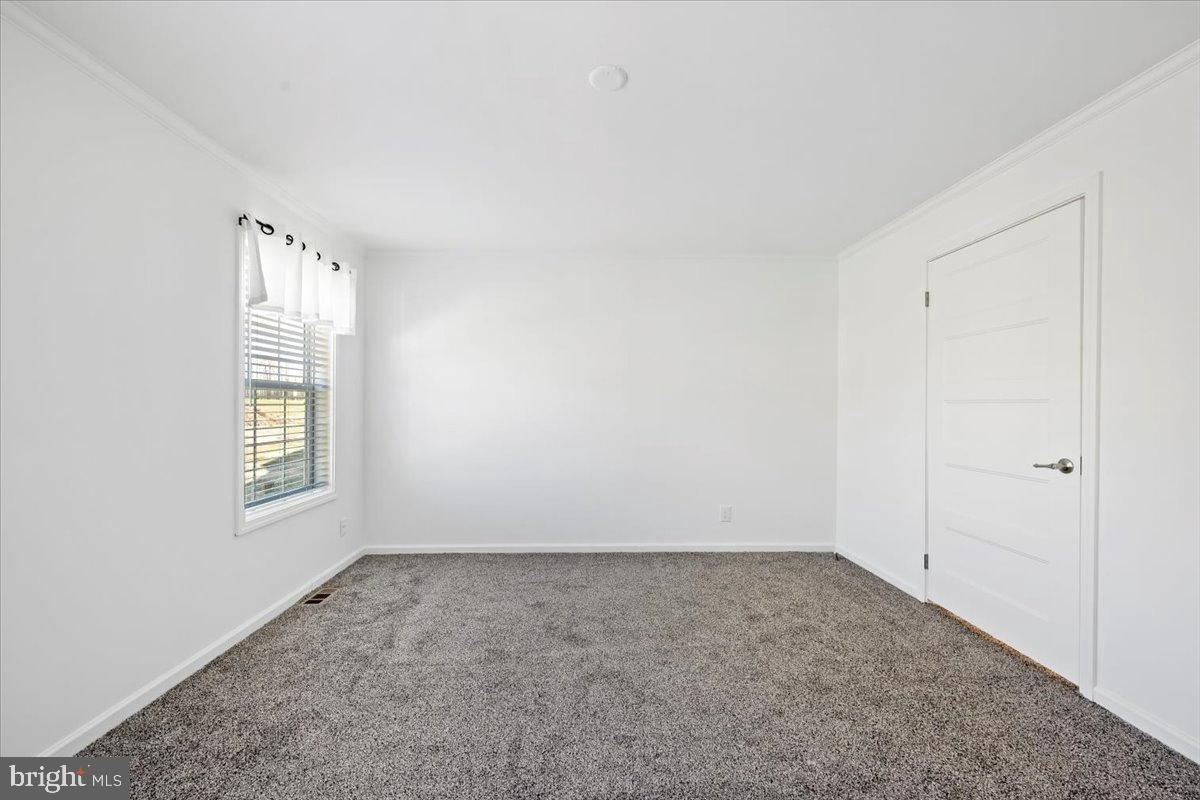 1412 Heytesbury Road Walnutport, PA 18088 - Photo 34 of 39 an empty room with a window