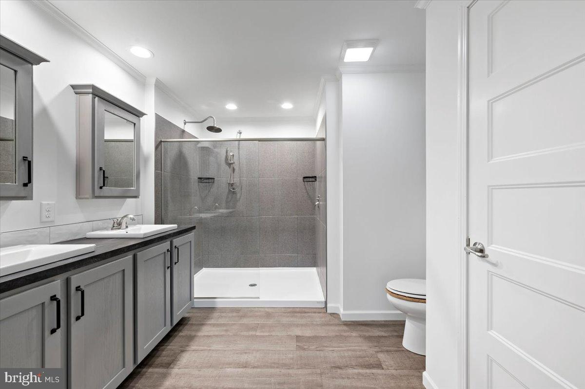 1412 Heytesbury Road Walnutport, PA 18088 - Photo 36 of 39 a bathroom with a sink a toilet and shower