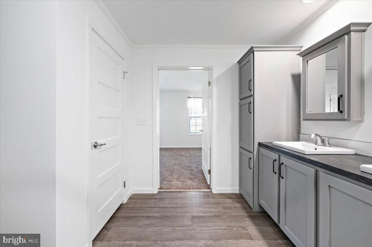 1412 Heytesbury Road Walnutport, PA 18088 - Photo 37 of 39 a bathroom with a sink and a mirror