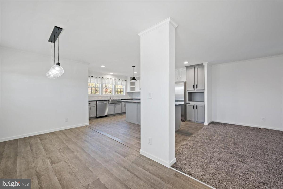 1412 Heytesbury Road Walnutport, PA 18088 - Photo 9 of 39 a view of a kitchen with a sink and refrigerator