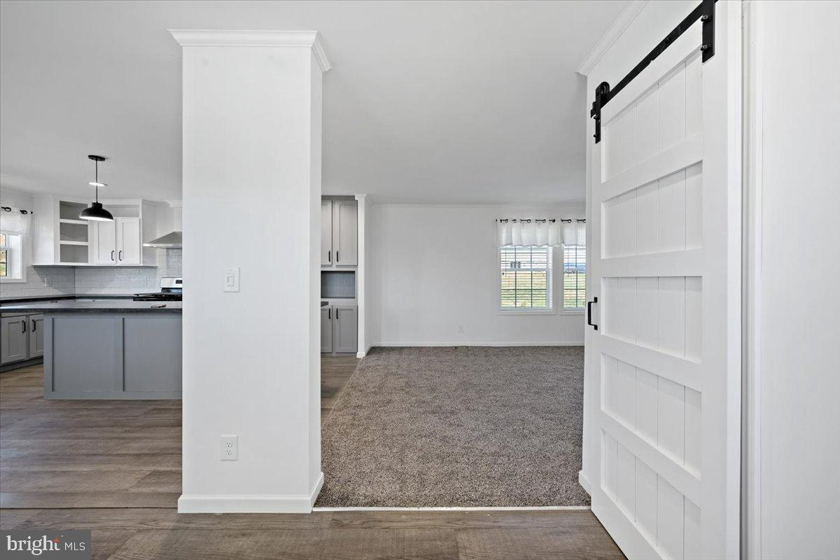 1412 Heytesbury Road Walnutport, PA 18088 - Photo 10 of 39 a view of an empty room with kitchen and window