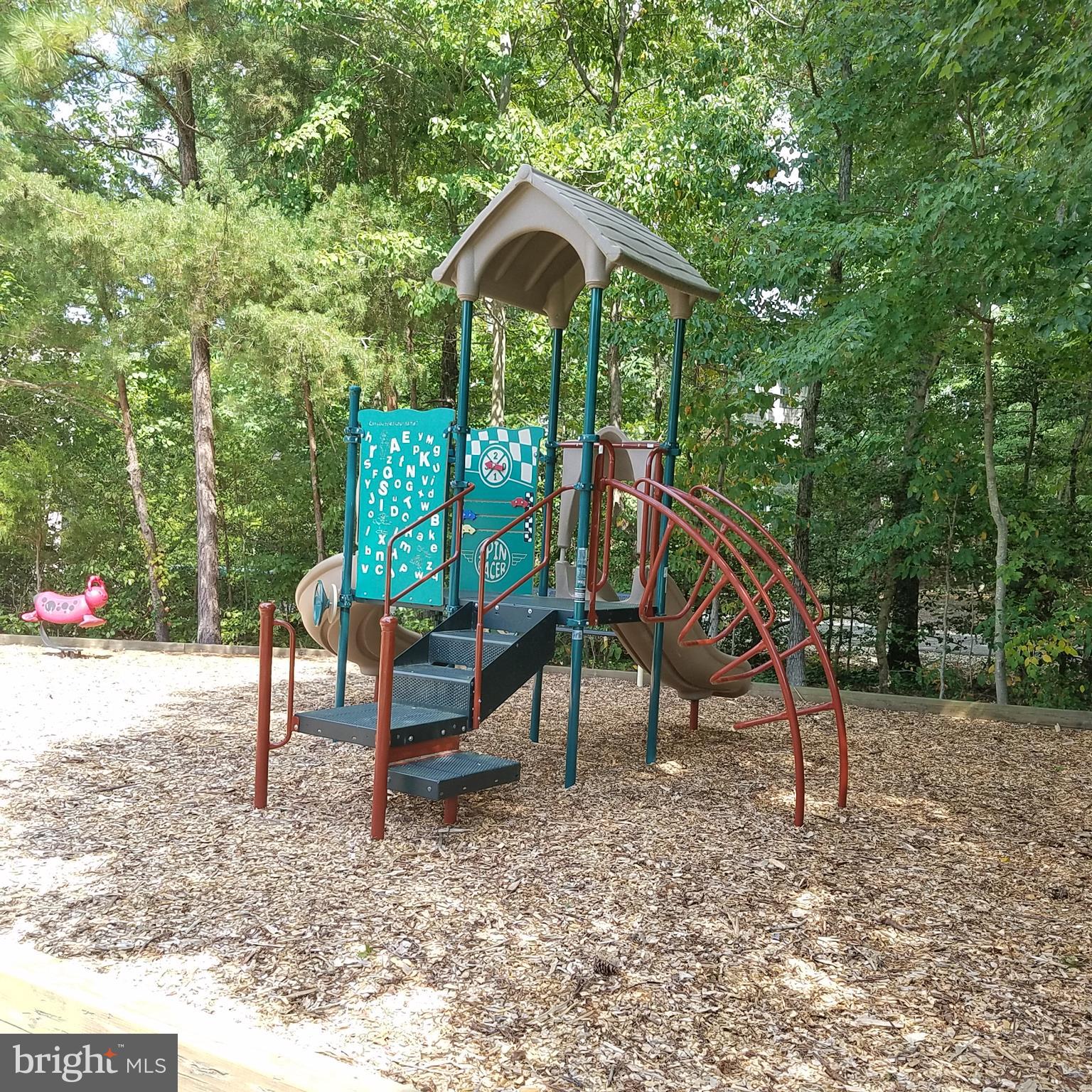 526 Runabout Loop Solomons, MD 20688 - Photo 31 of 33 Kids play area adjacent to pool
