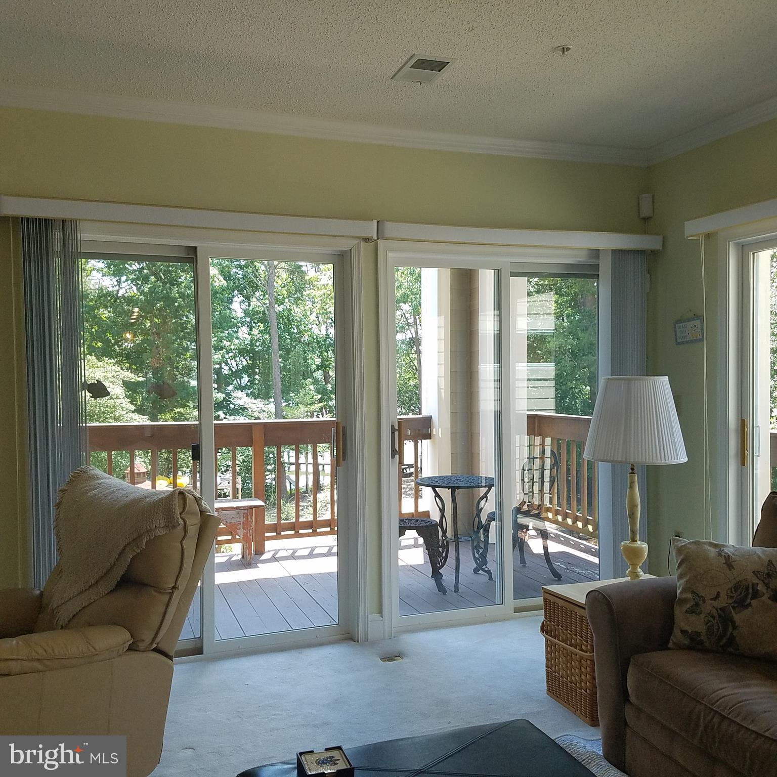 526 Runabout Loop Solomons, MD 20688 - Photo 5 of 33 Walkout to private deck with water views