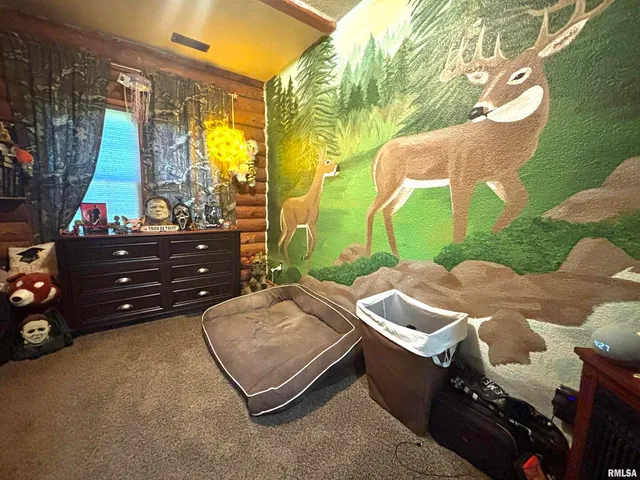 a bathroom with a toilet a sink and a mirror