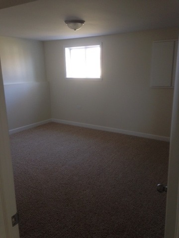 193 South Pinecrest Road Bolingbrook, IL 60440 - Photo 12 of 21 an empty room with a window