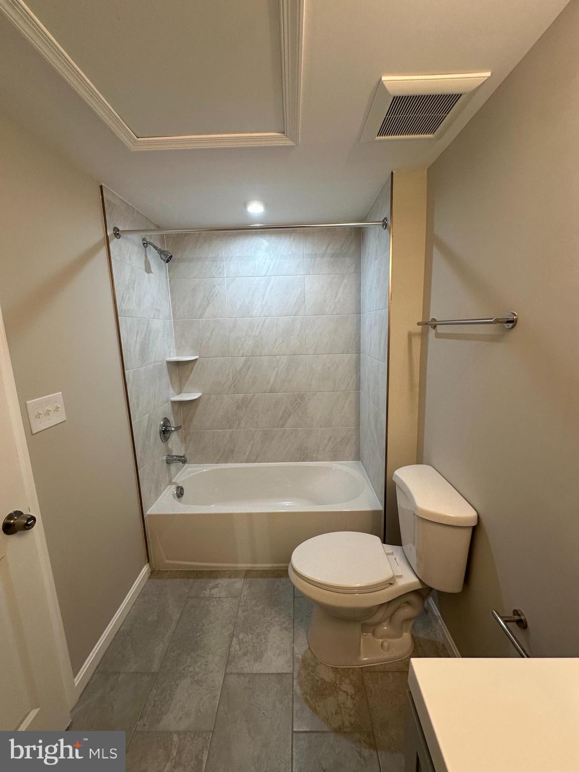 1812 H Place Northeast, Unit B02 Washington, DC 20002 - Photo 5 of 13 a bathroom with a toilet and a shower
