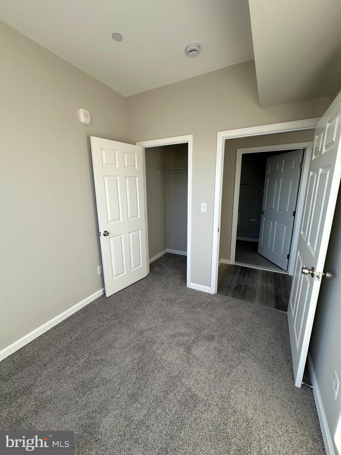 1812 H Place Northeast, Unit B02 Washington, DC 20002 - Photo 8 of 13 an empty room with windows