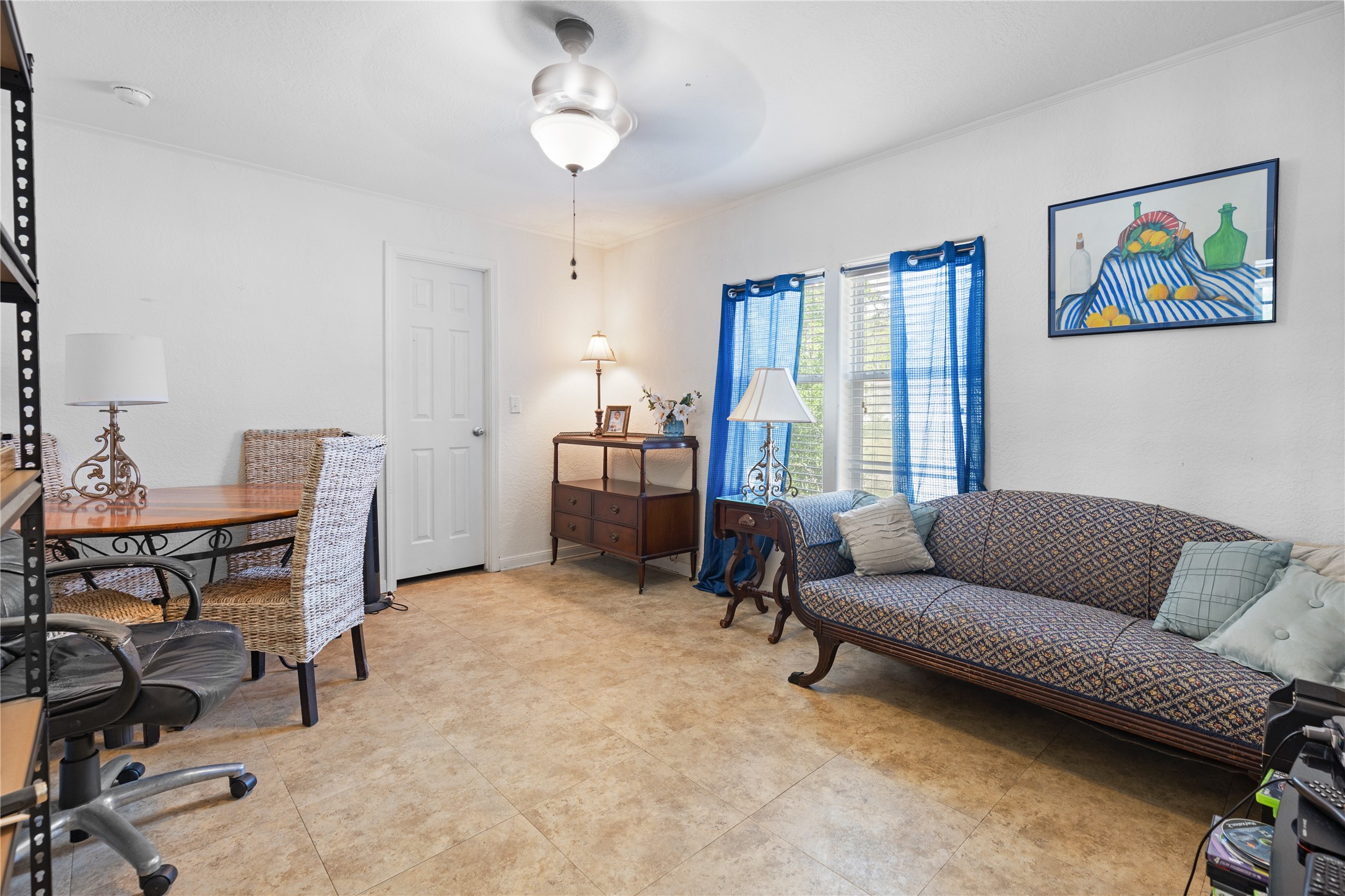 174 Lake Front Drive Trinity, TX 75862 - Photo 11 of 44 a living room with furniture a dining table and a window