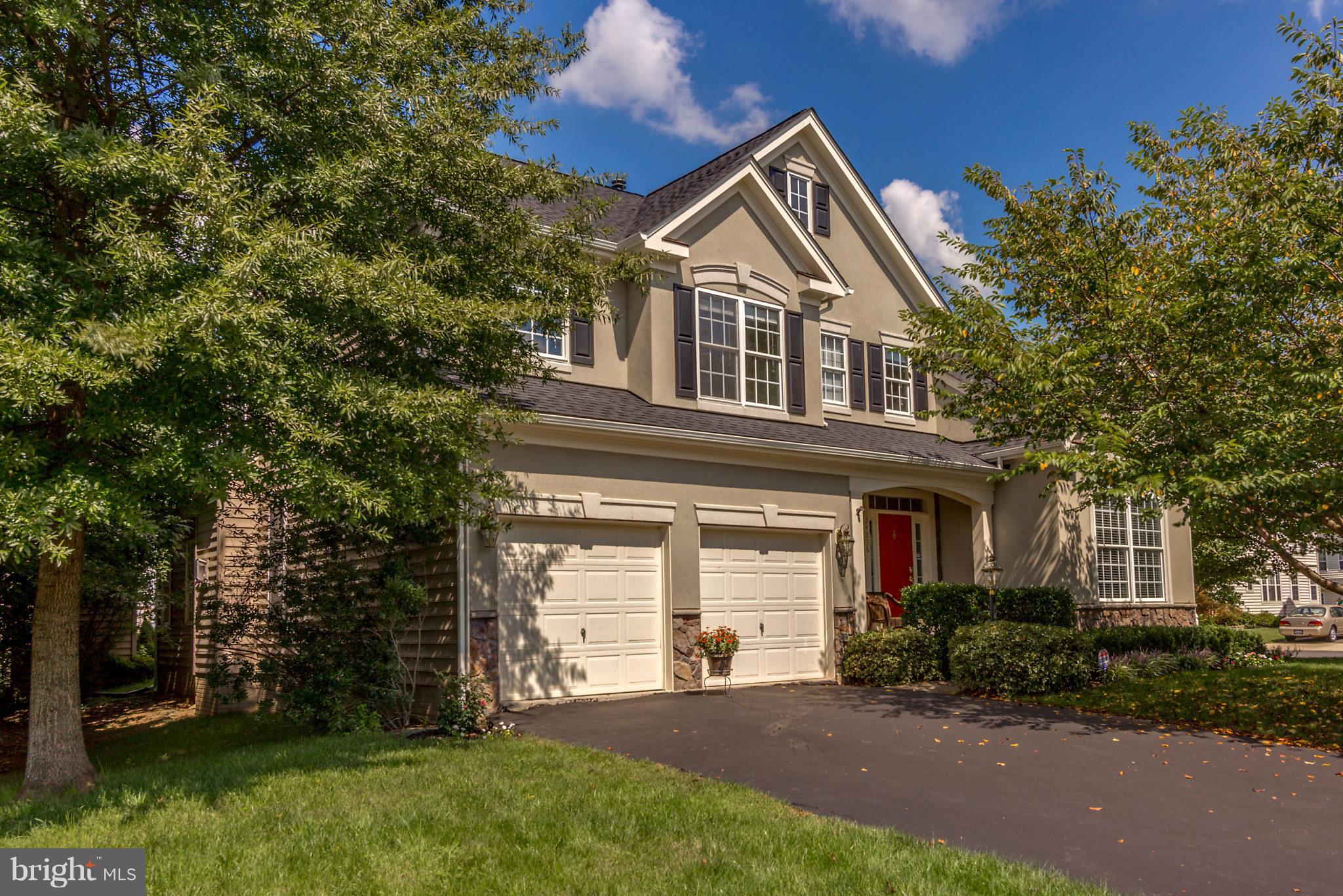 24806 Prairie Grass Drive Aldie, VA 20105 - Photo 2 of 30 a front view of a house with a yard