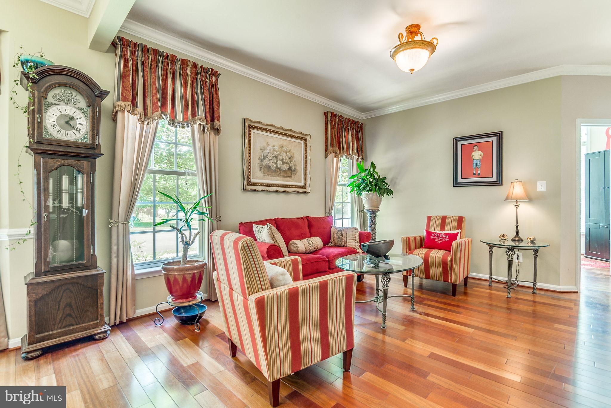 24806 Prairie Grass Drive Aldie, VA 20105 - Photo 12 of 30 a living room with furniture and a window