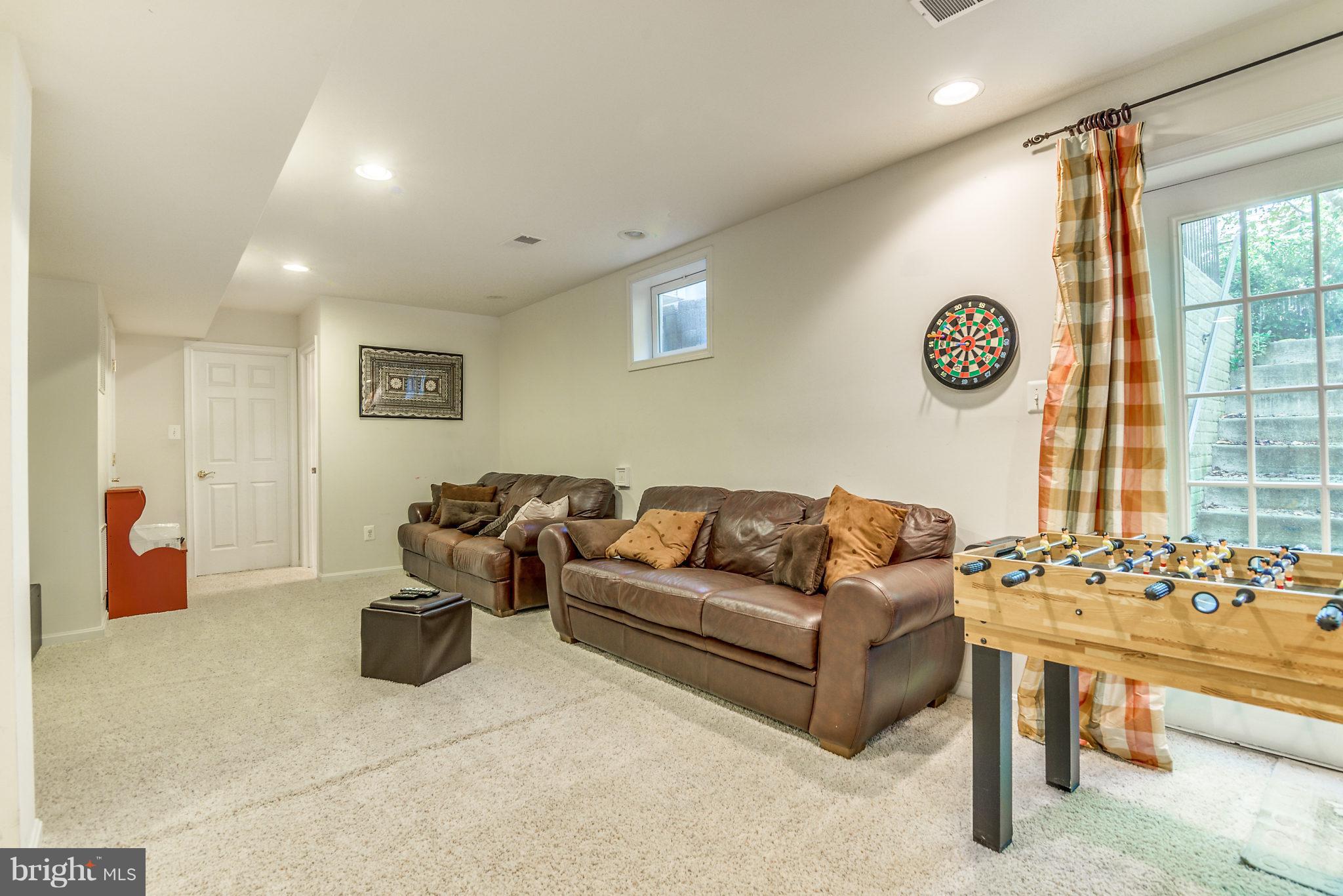 24806 Prairie Grass Drive Aldie, VA 20105 - Photo 26 of 30 a living room with furniture and a large window
