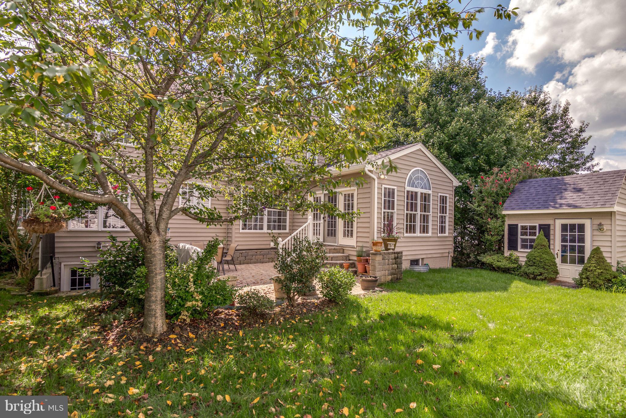 24806 Prairie Grass Drive Aldie, VA 20105 - Photo 29 of 30 a front view of a house with a garden