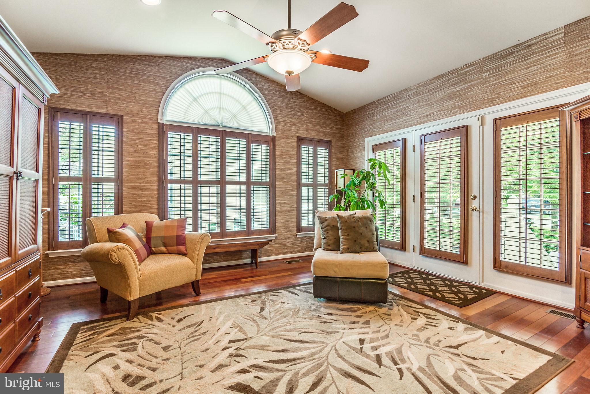 24806 Prairie Grass Drive Aldie, VA 20105 - Photo 5 of 30 a living room with furniture and a large window