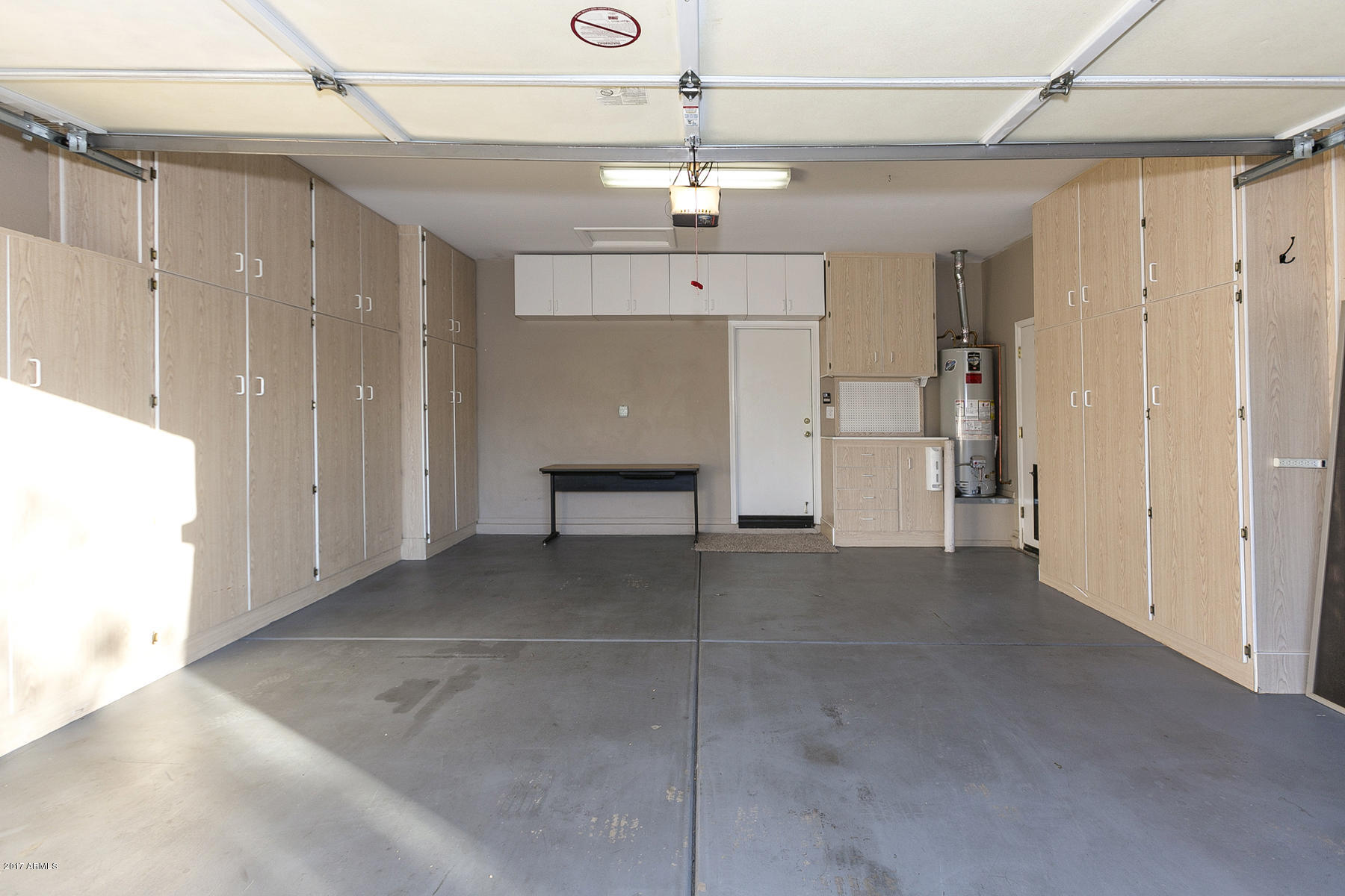 41621 North Cedar Chase Road Anthem, AZ 85086 - Photo 24 of 51 Garage with Built in Cabinets