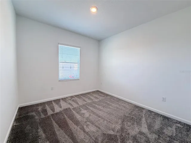 a view of a room with a bench