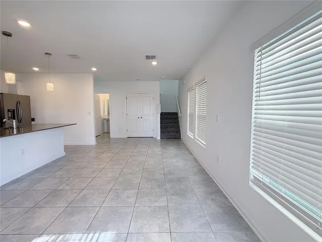a view of a hallway with closet