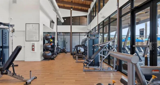 a view of a swimming pool with a yard