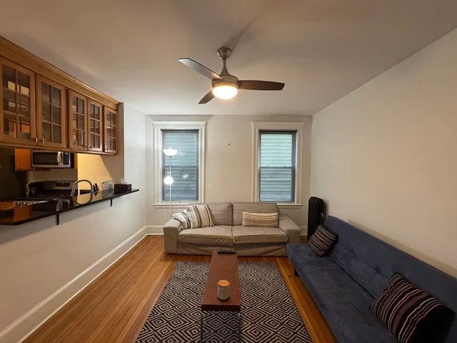a living room with furniture and a couch