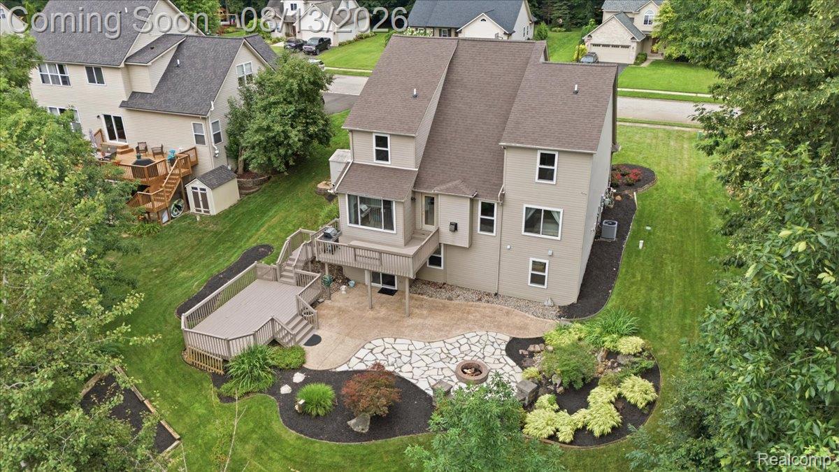 1393 Remsing Street Hartland, MI 48353 - Photo 6 of 71 Two-level deck and patio for entertaining