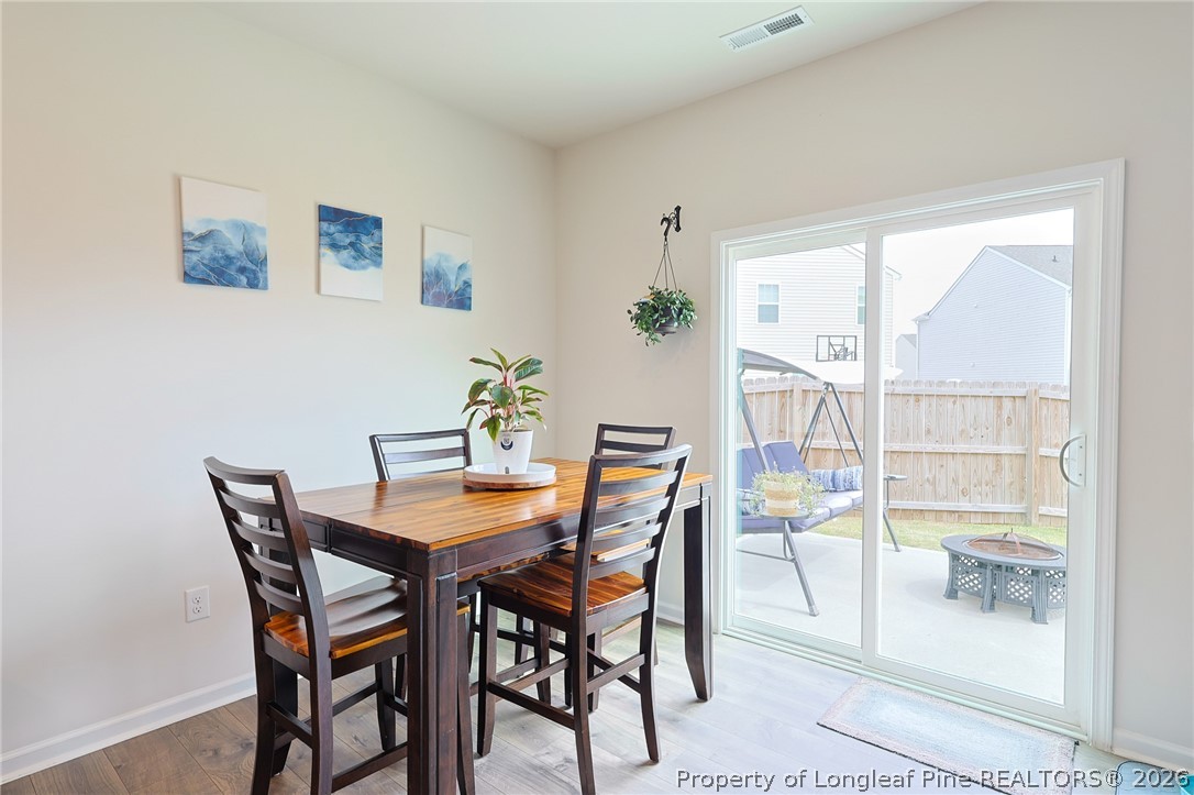 2129 Clydesmill Road Fayetteville, NC 28314 - Photo 10 of 36 a view of a dining room with furniture