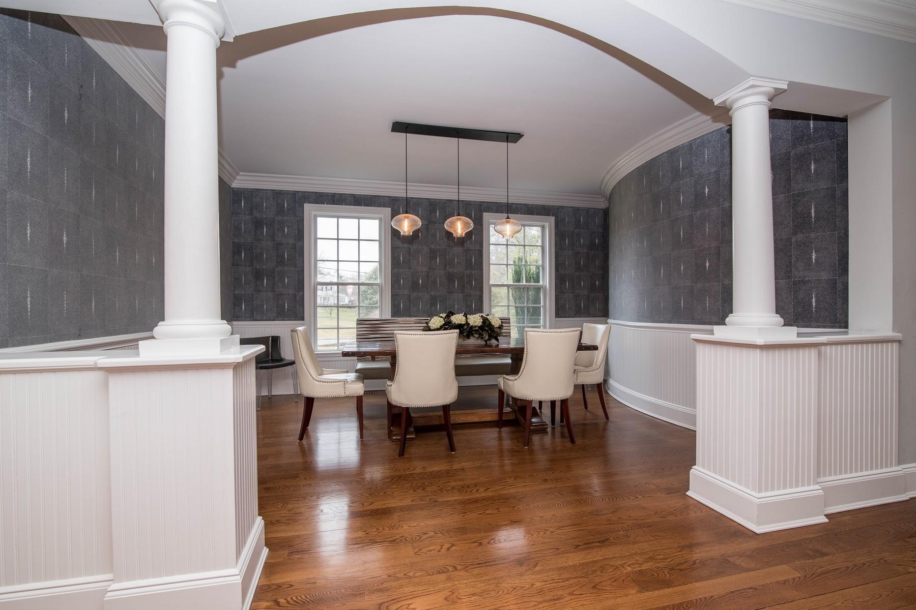 38 Pembroke Road Darien, CT 06820 - Photo 14 of 41 a view of a dining room with furniture window and wooden floor