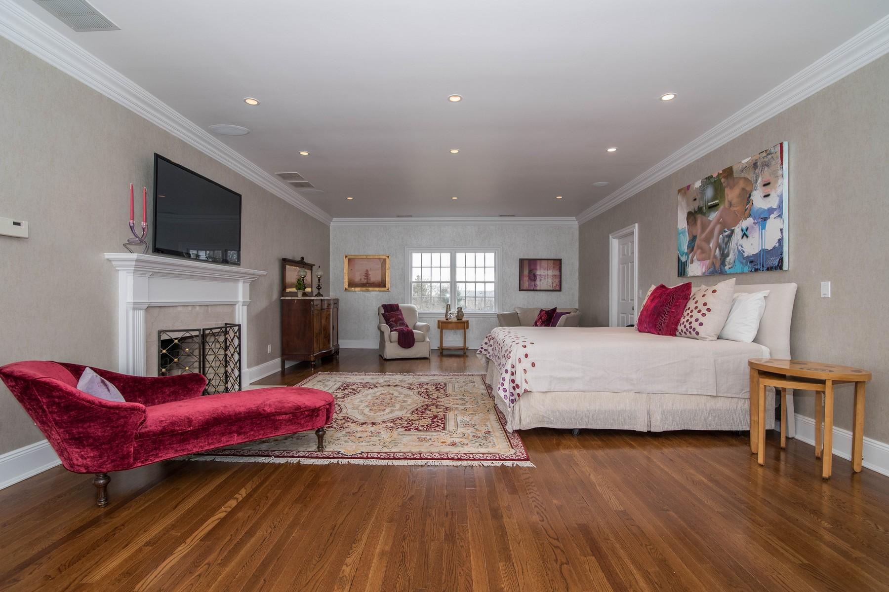 38 Pembroke Road Darien, CT 06820 - Photo 19 of 41 a living room with furniture fireplace and flat screen tv