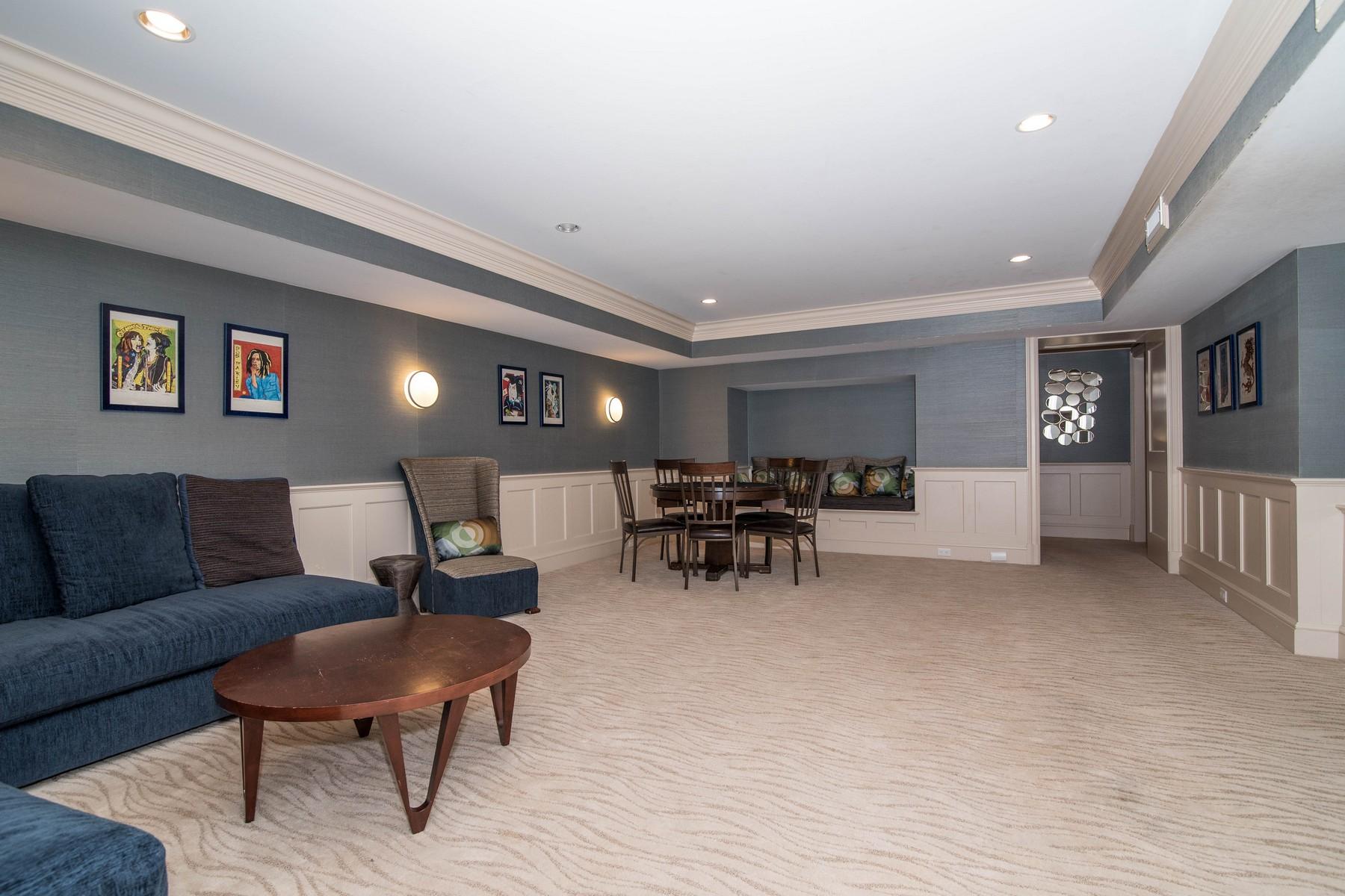 38 Pembroke Road Darien, CT 06820 - Photo 27 of 41 a living room with furniture and a table