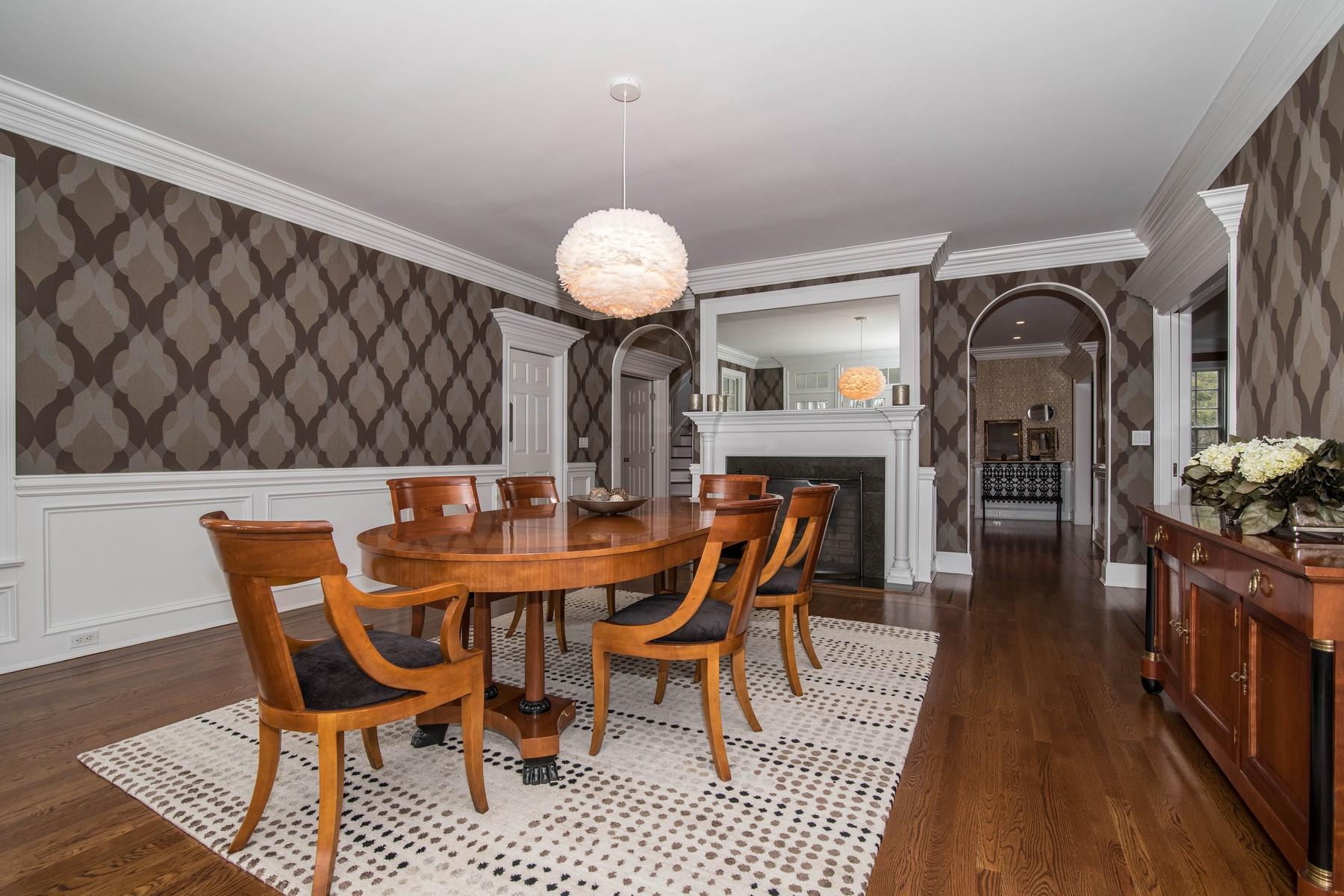 38 Pembroke Road Darien, CT 06820 - Photo 10 of 41 a view of a dining room with furniture and wooden floor