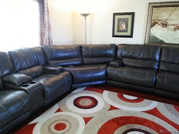 5431 Hackney Road Richmond, VA 23234 - Photo 5 of 17 a living room with furniture and a rug