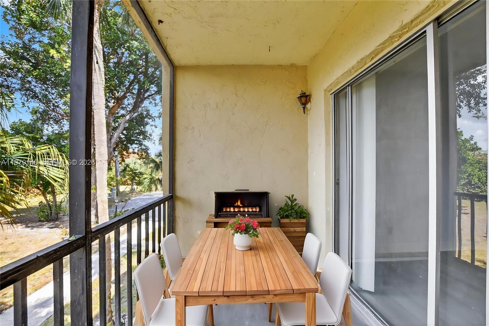 450 Northwest 20th Street, Unit 2120 Boca Raton, FL 33431 - Photo 21 of 27 a view of a balcony with a patio