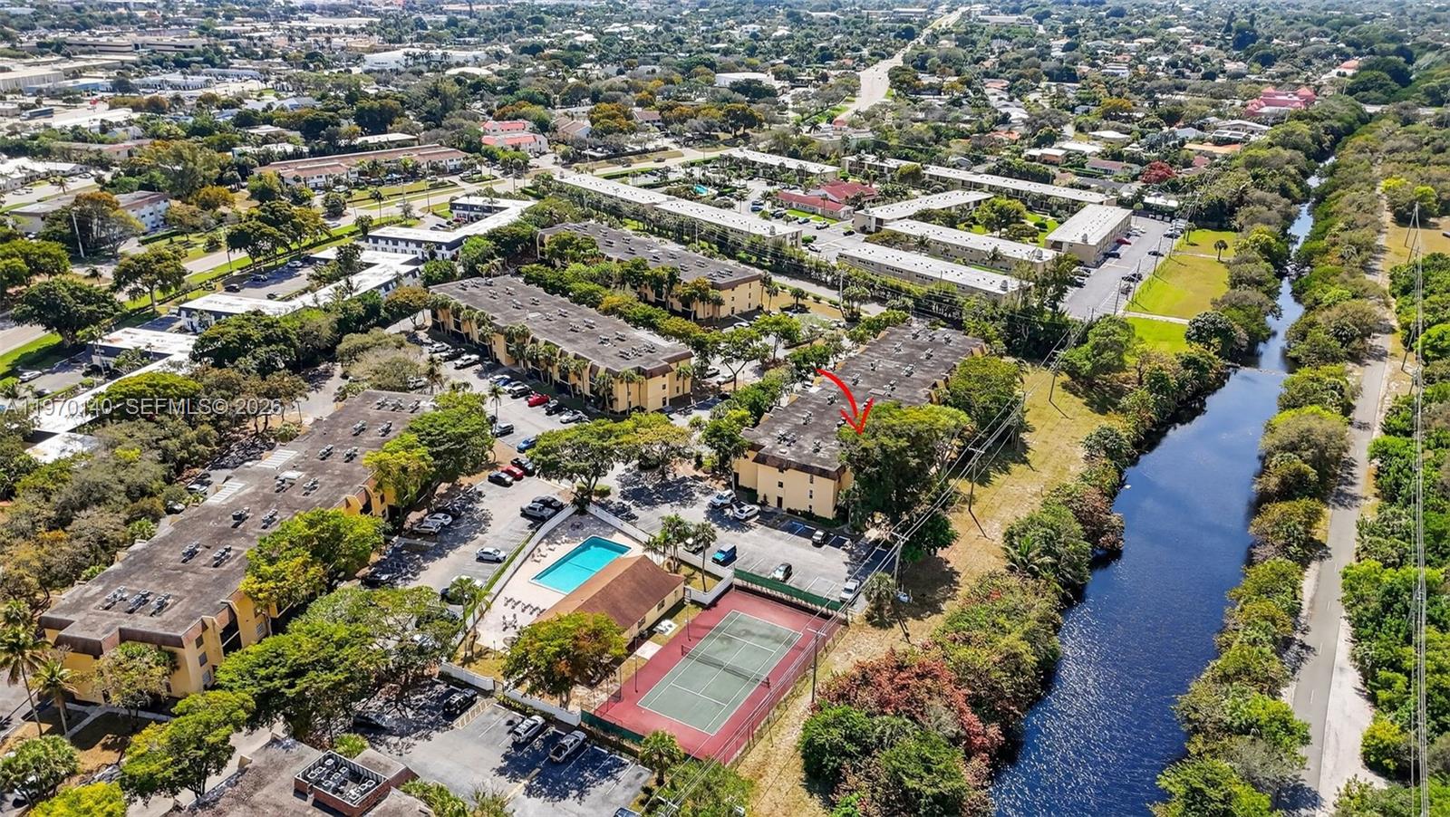 450 Northwest 20th Street, Unit 2120 Boca Raton, FL 33431 - Photo 26 of 27 an aerial view of residential houses with outdoor space
