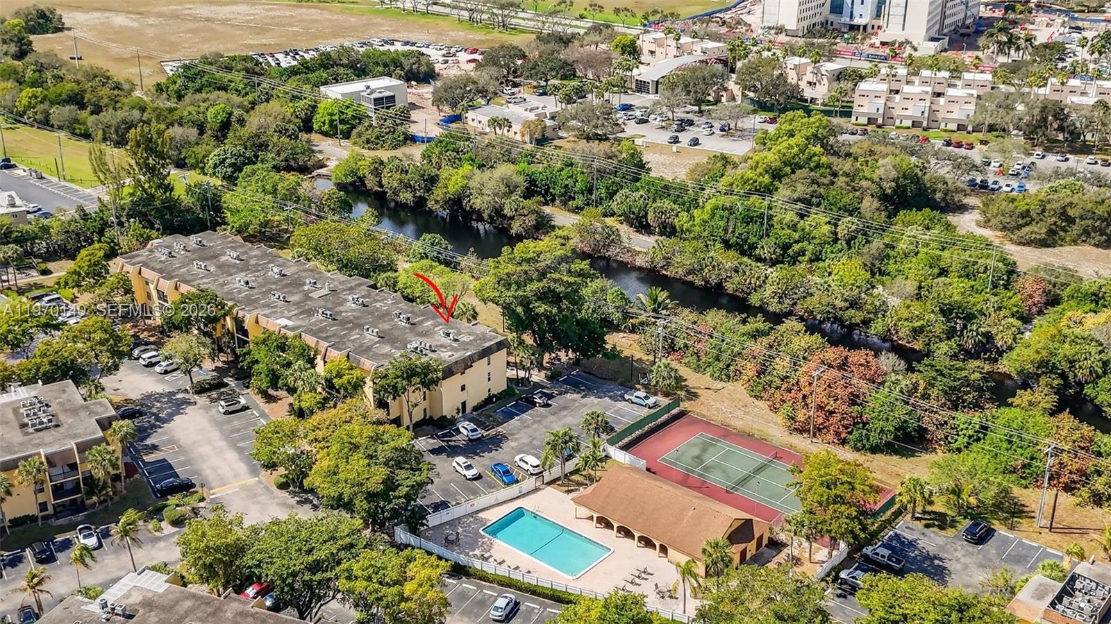 450 Northwest 20th Street, Unit 2120 Boca Raton, FL 33431 - Photo 27 of 27 an aerial view of residential house with outdoor space and swimming pool