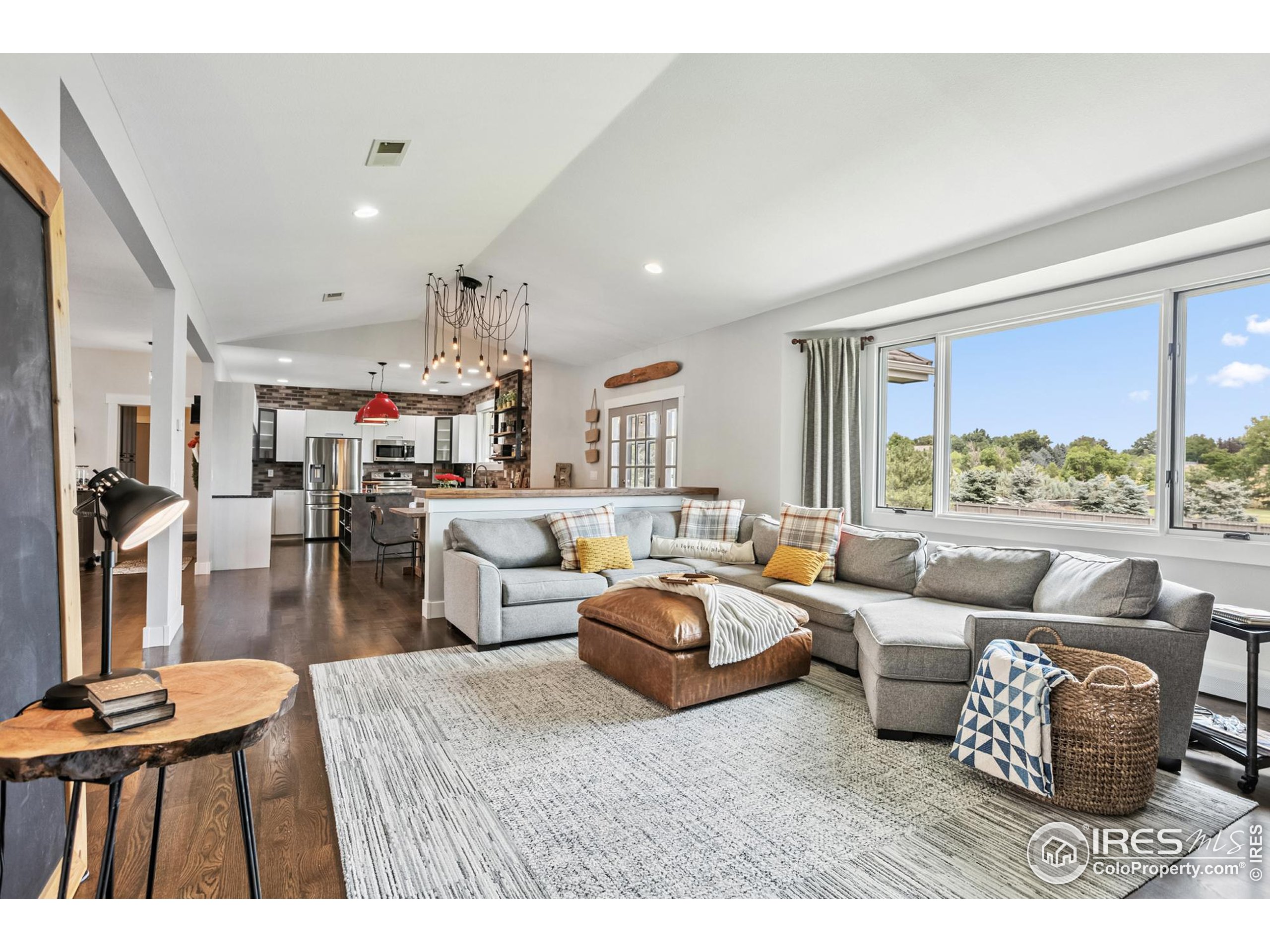 3310 Routt Street Wheat Ridge, CO 80033 - Photo 11 of 35 a living room with furniture and a large window