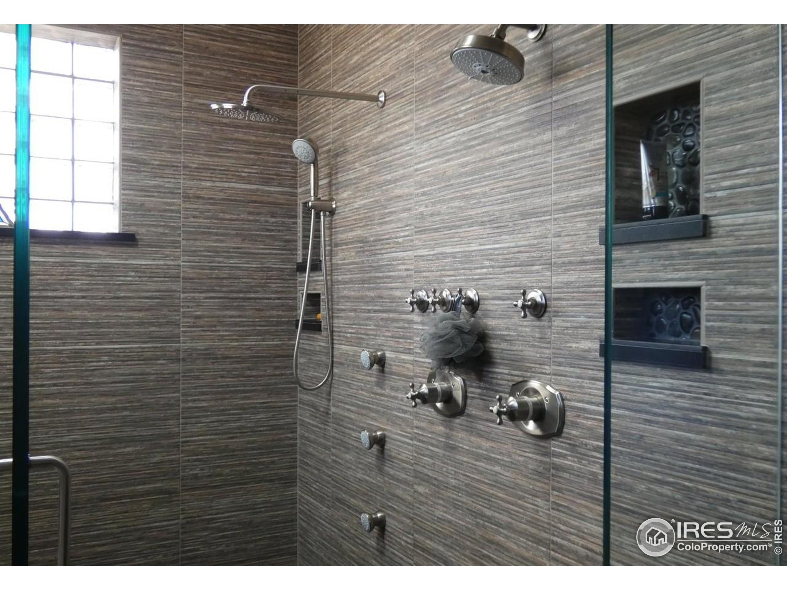 3310 Routt Street Wheat Ridge, CO 80033 - Photo 16 of 35 a view of bathroom with wooden floor