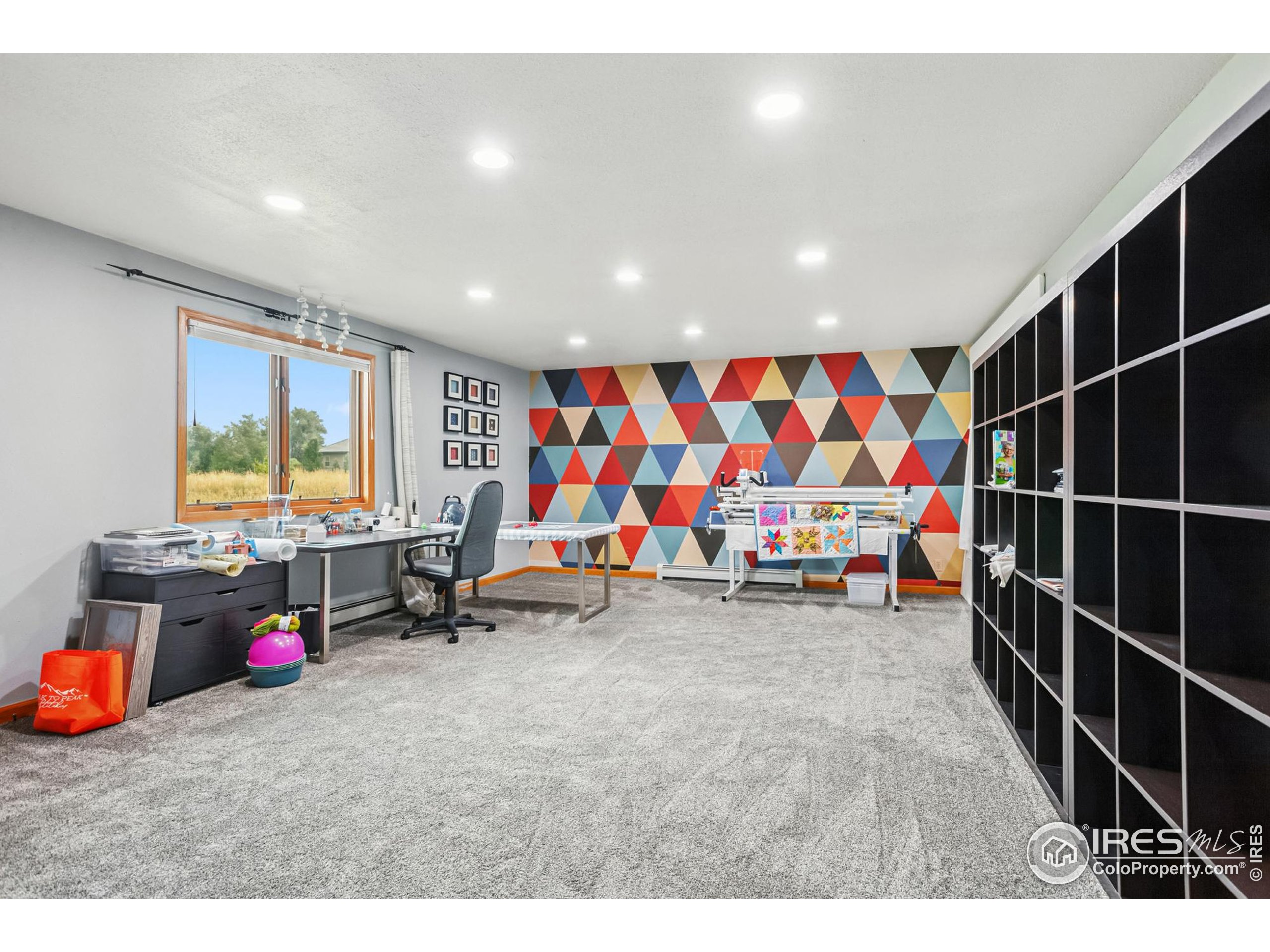 3310 Routt Street Wheat Ridge, CO 80033 - Photo 25 of 35 a living room with furniture and white walls