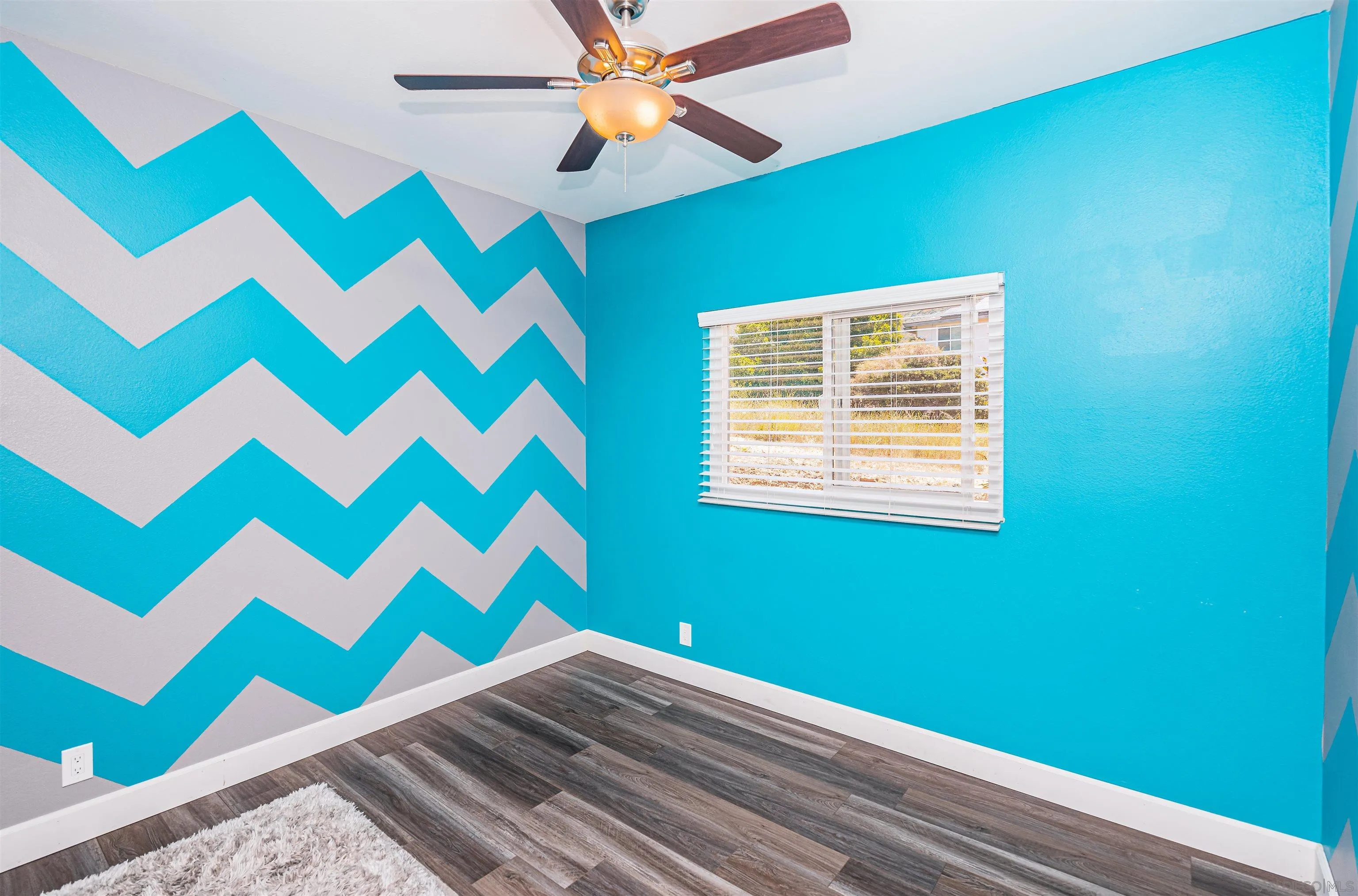16754 Georgios Way Ramona, CA 92065 - Photo 16 of 29 a view of empty room with window and ceiling fan