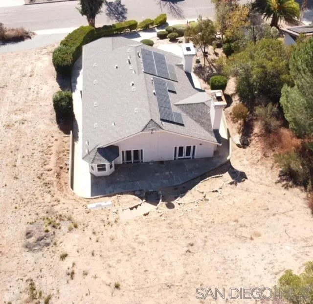 16754 Georgios Way Ramona, CA 92065 - Photo 25 of 29 a view of a large building in the background