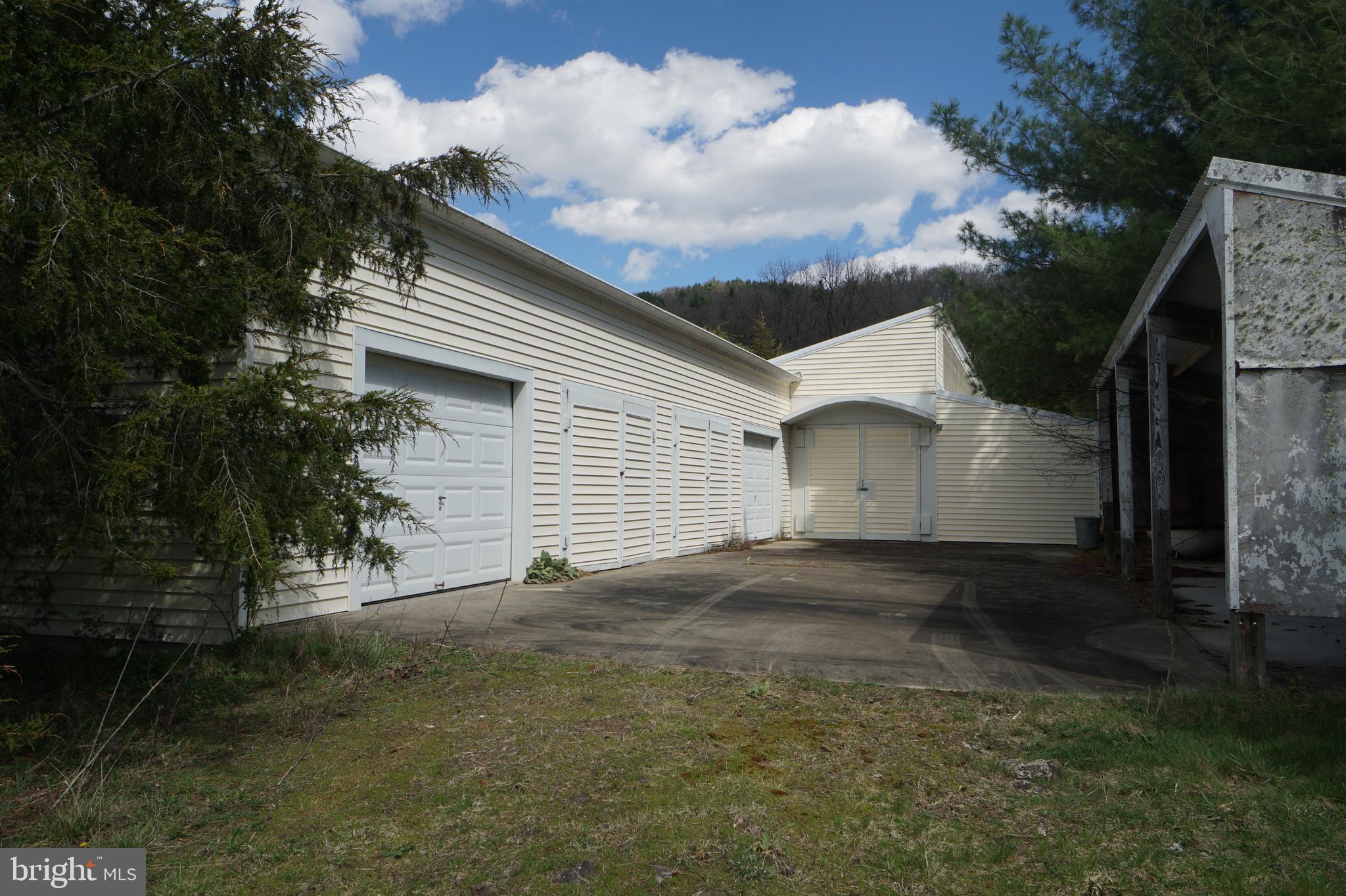 1873 Capito Hill Road Franklin, WV 26807 - Photo 13 of 72 a view of a house with a yard