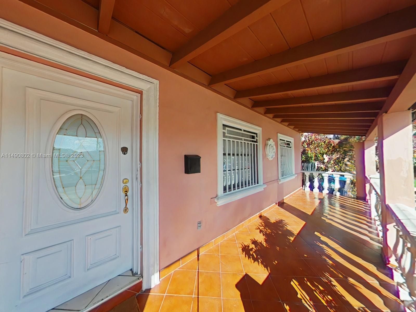 5643 Southwest 7th Street Miami, FL 33144 - Photo 2 of 25 a view of an entryway with a livingroom
