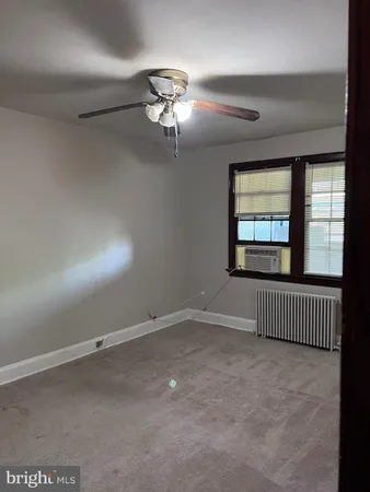 en empty room with windows