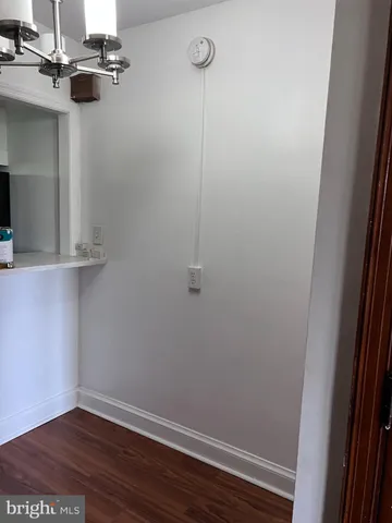 a view of a room with rack on the wall