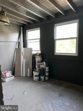 a room with furniture and window