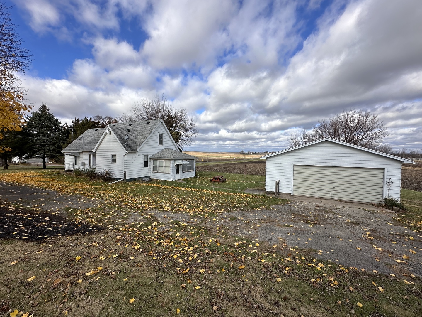 14050 Agnew Road Sterling, IL 61081 - Photo 1 of 27 a view of a house with a yard