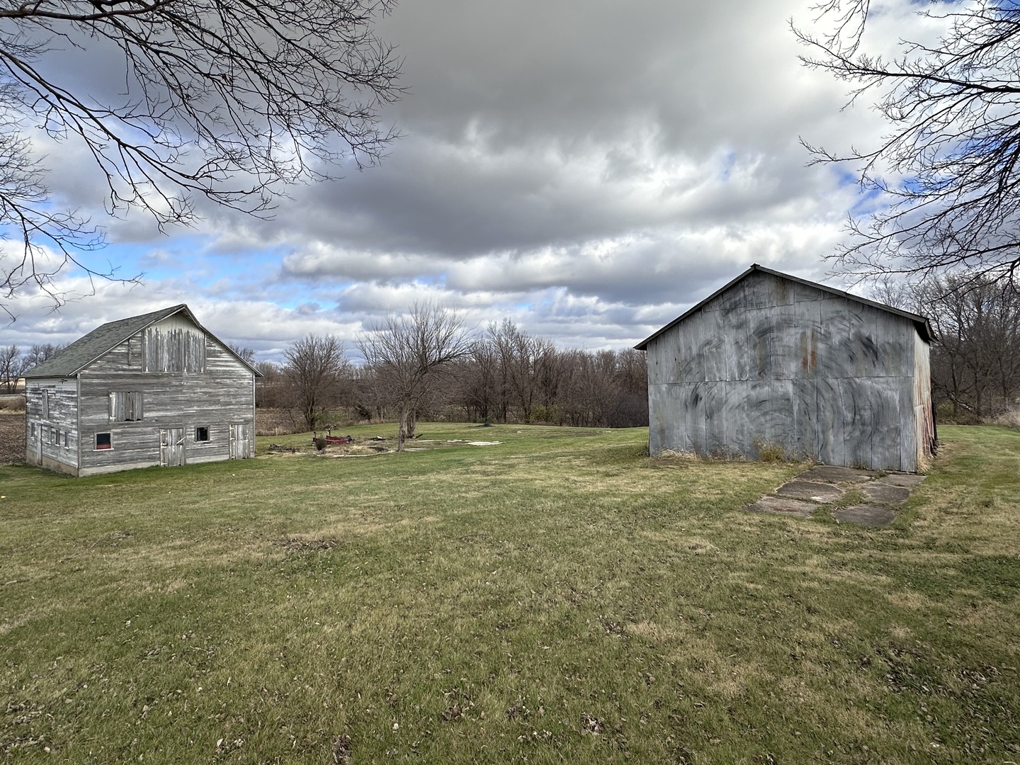 14050 Agnew Road Sterling, IL 61081 - Photo 10 of 27 a view of a house with a yard