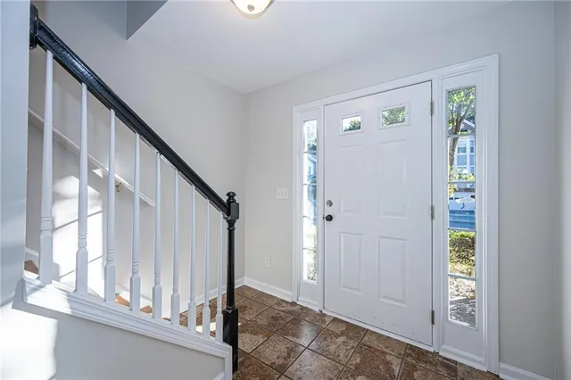 a view of an entryway with staircase