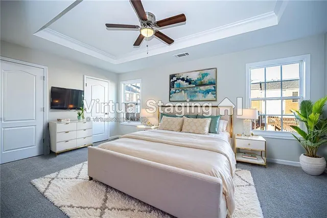 a bed room with furniture and a flat screen tv