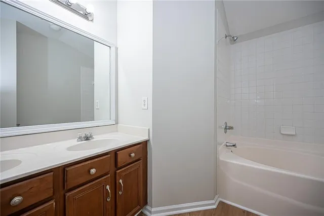a bathroom with a sink and a bathtub