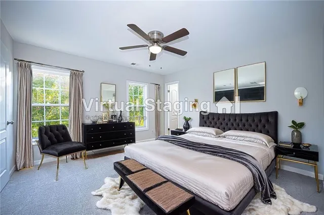 a bedroom with a bed and a couch