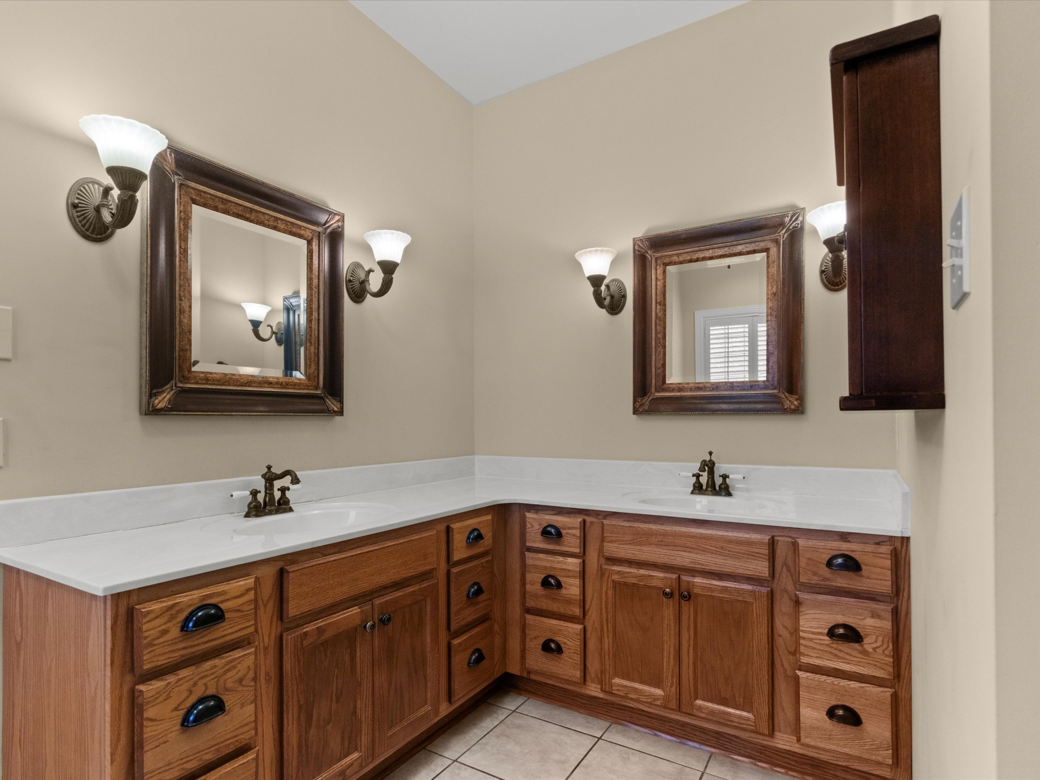 715 South Clinton Street Athens, AL 35611 - Photo 14 of 63 a bathroom with a double vanity sink and mirror